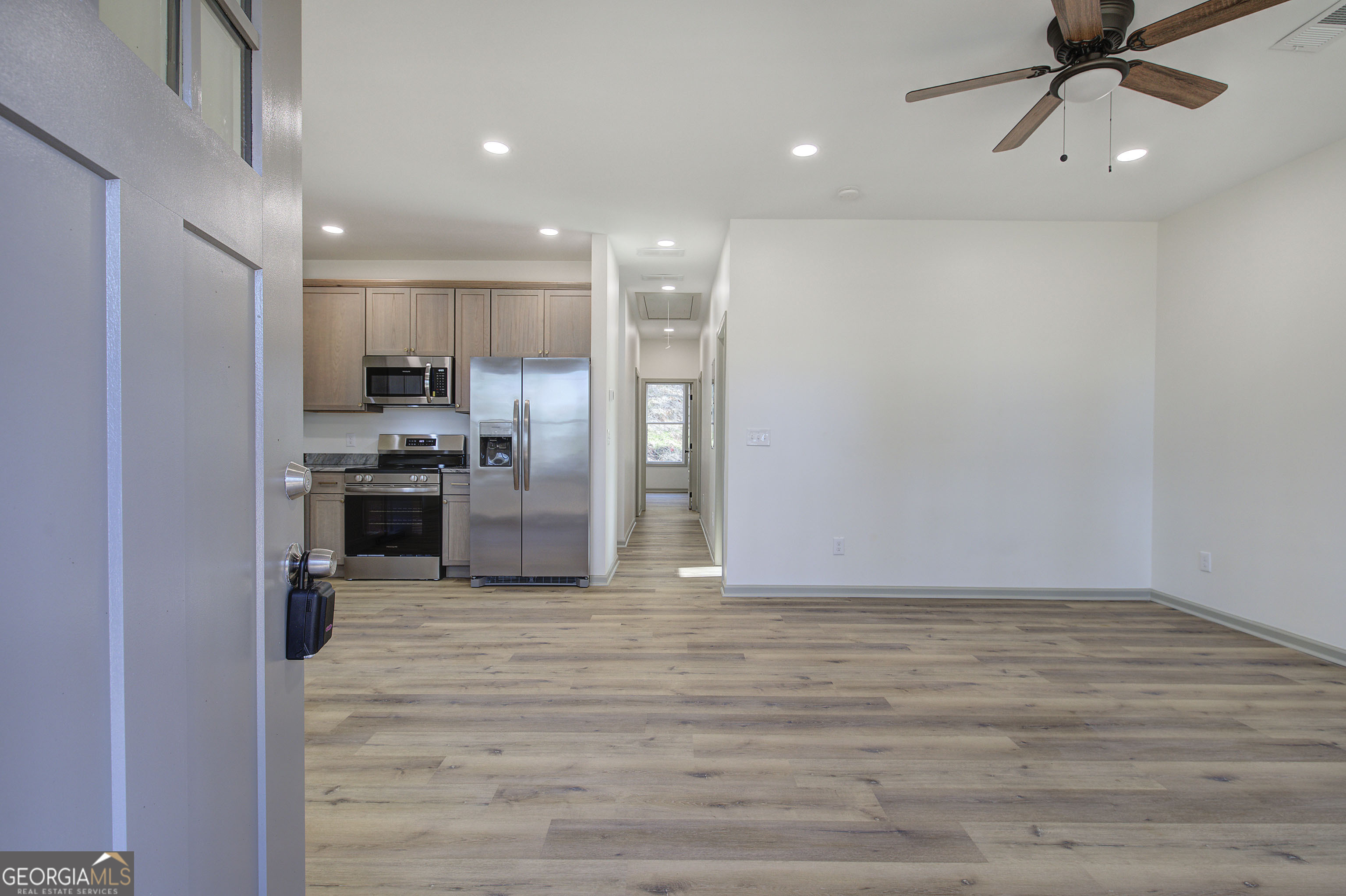 115 East Boundary Rome, GA 30161 - Photo 3 of 34 a view of kitchen with microwave and refrigerator
