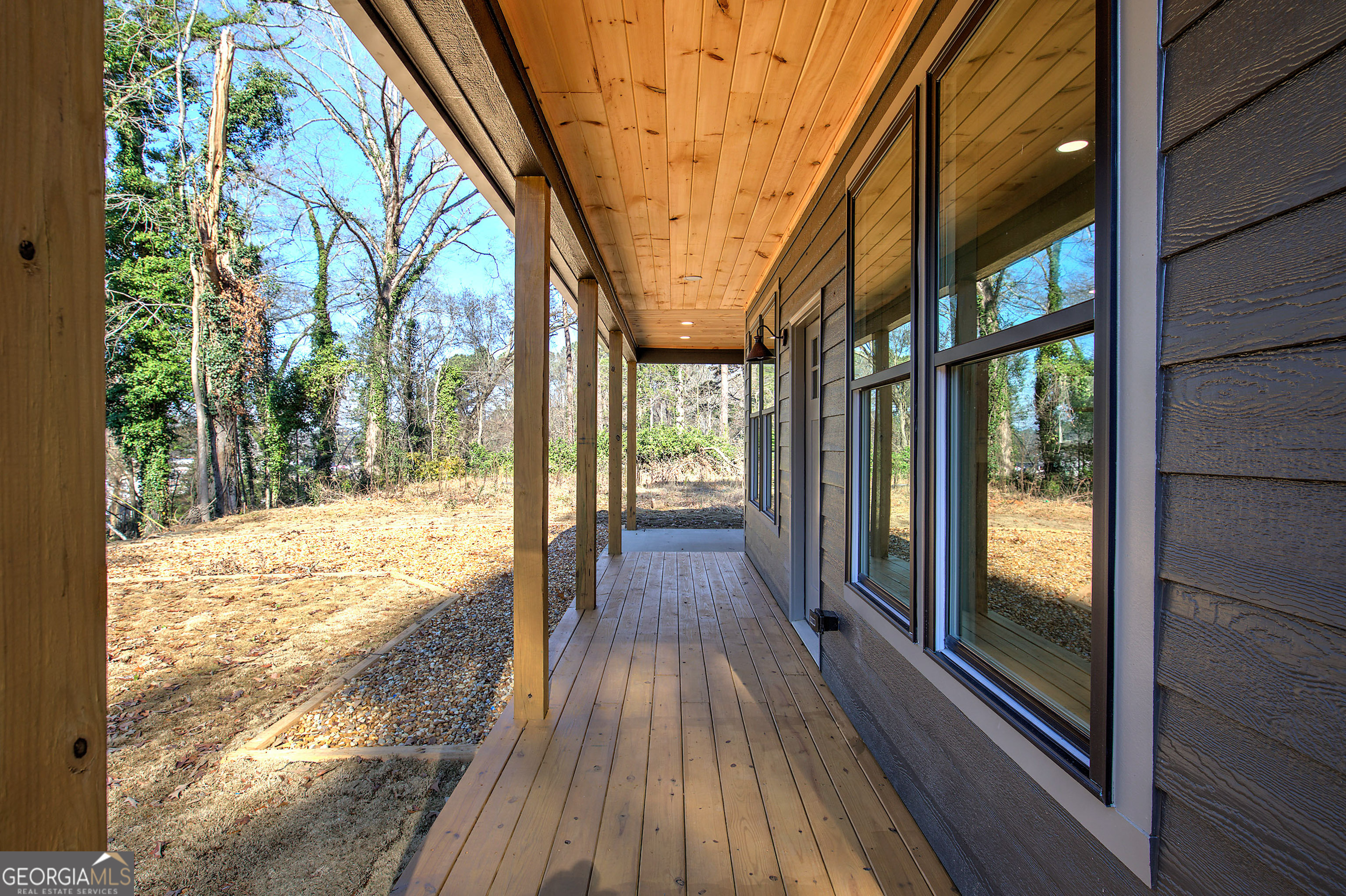 115 East Boundary Rome, GA 30161 - Photo 31 of 34 a view of porch with wooden floor and fence