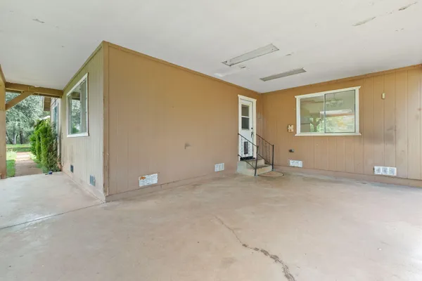 an empty room with windows