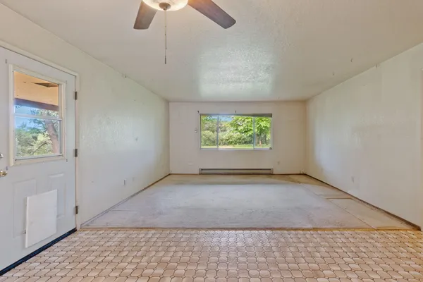 a view of a livingroom with a staircase