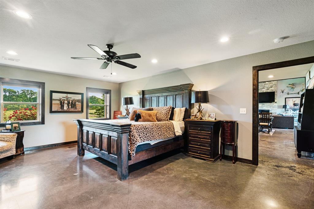 962 County Road Pattonville, TX 75468 - Photo 19 of 37 a bed room with furniture and a window