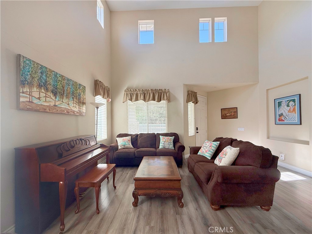 23964 Old Pomegranate Road Yorba Linda, CA 92887 - Photo 11 of 30 a living room with furniture and a wooden floor