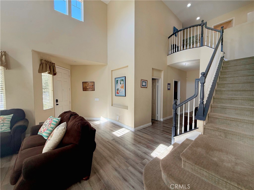 23964 Old Pomegranate Road Yorba Linda, CA 92887 - Photo 16 of 30 a living room with furniture and stairs
