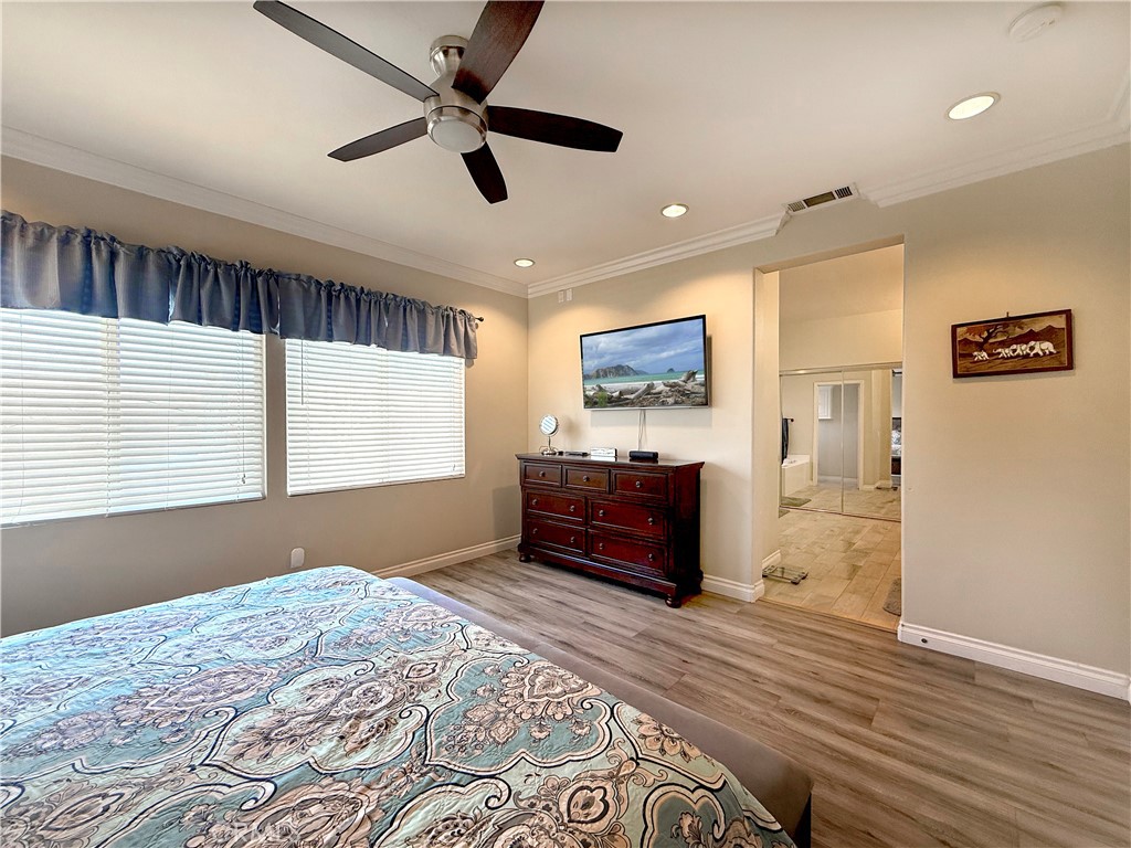 23964 Old Pomegranate Road Yorba Linda, CA 92887 - Photo 20 of 30 a bedroom with a bed and a dresser
