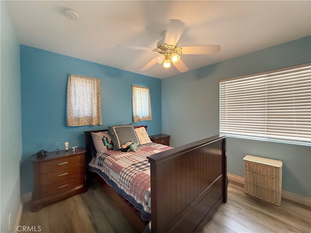 23964 Old Pomegranate Road Yorba Linda, CA 92887 - Photo 21 of 30 a bedroom with a bed and a window
