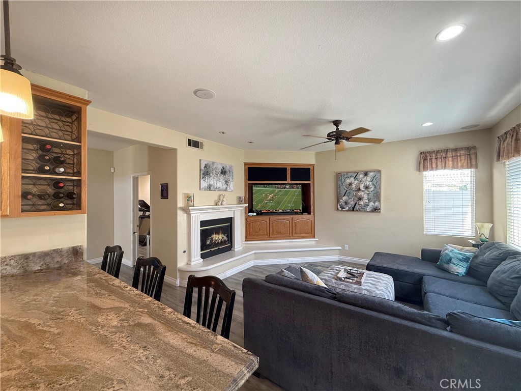 23964 Old Pomegranate Road Yorba Linda, CA 92887 - Photo 7 of 30 a living room with furniture flat screen tv and window