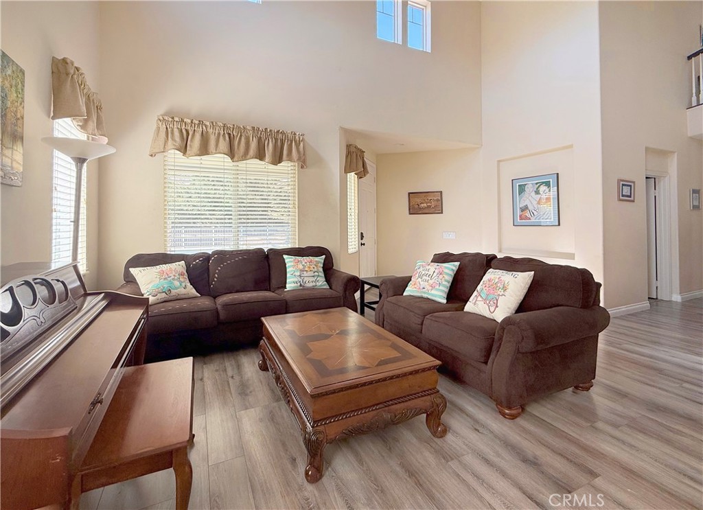 23964 Old Pomegranate Road Yorba Linda, CA 92887 - Photo 10 of 30 a living room with furniture and a large window