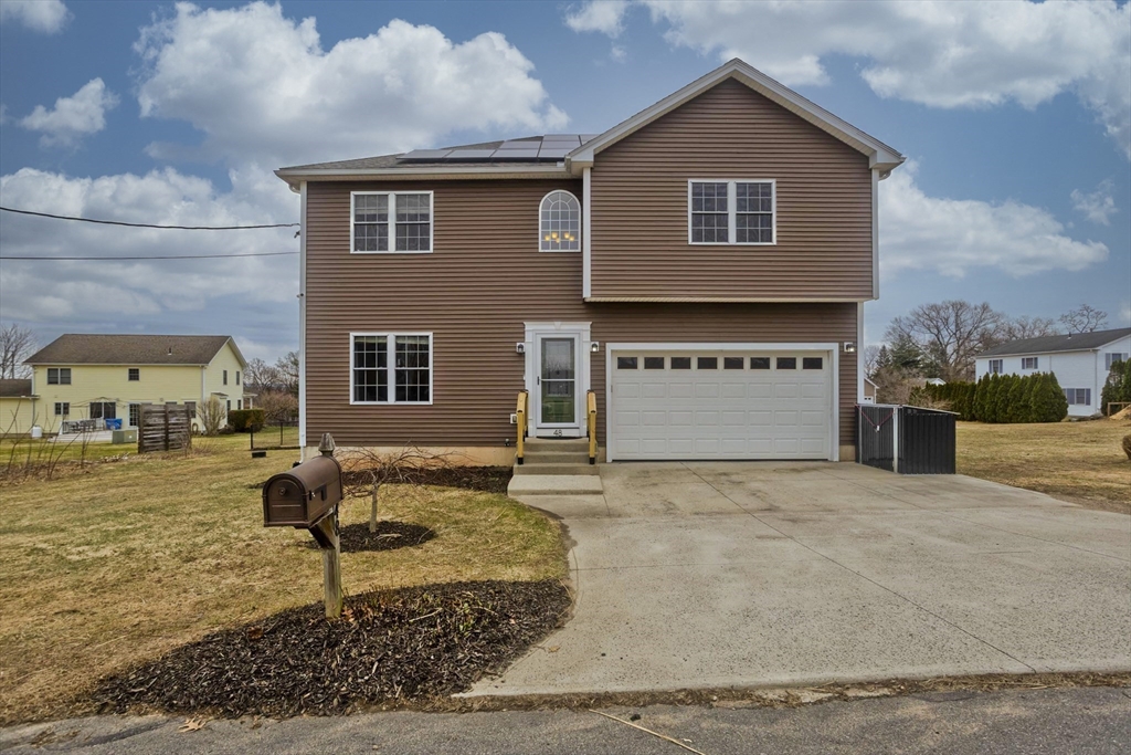 48 Mountain Avenue West Springfield, MA 01089 - Photo 1 of 39 a view of house and yard with wooden fence