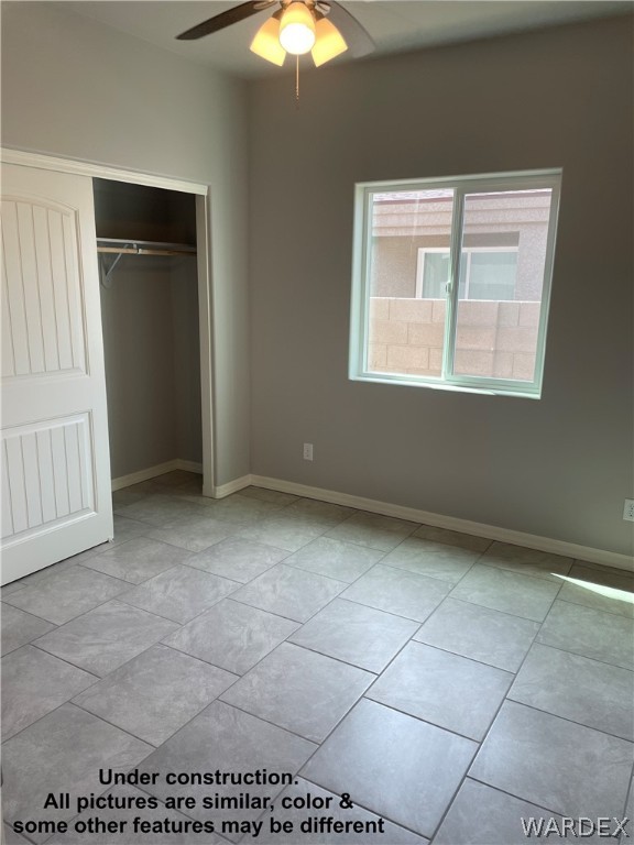 3555 North Kenneth Road Kingman, AZ 86409 - Photo 16 of 19 a view of an empty room with a window