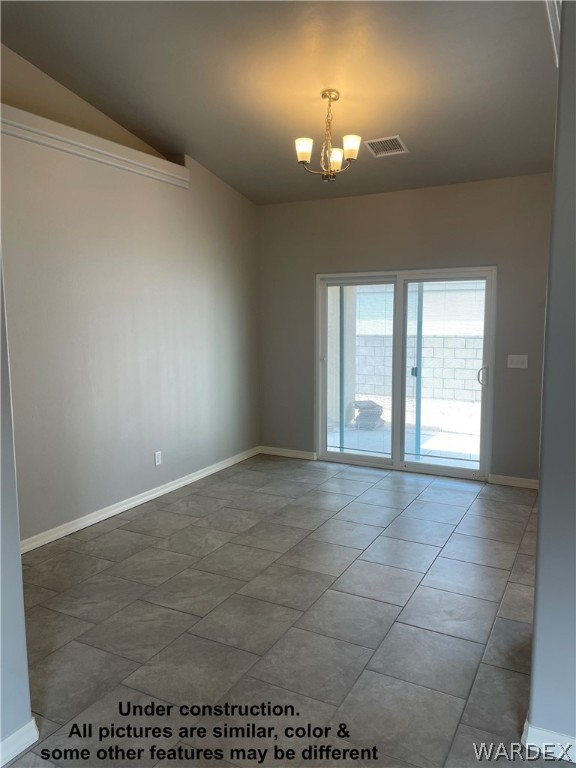 3555 North Kenneth Road Kingman, AZ 86409 - Photo 7 of 19 a view of an empty room with a window
