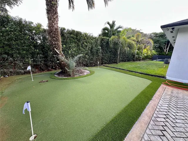 a view of a golf course with a park