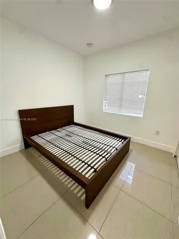 a view of sitting area with wooden floor