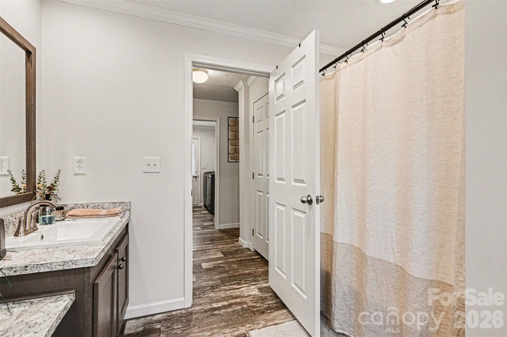 420 Hoffman Road Lincolnton, NC 28092 - Photo 14 of 25 a bathroom with a sink and a mirror