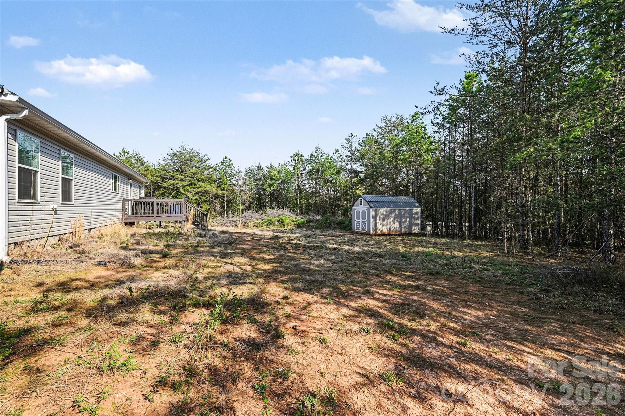 420 Hoffman Road Lincolnton, NC 28092 - Photo 23 of 25 a front view of a house with a yard and trees