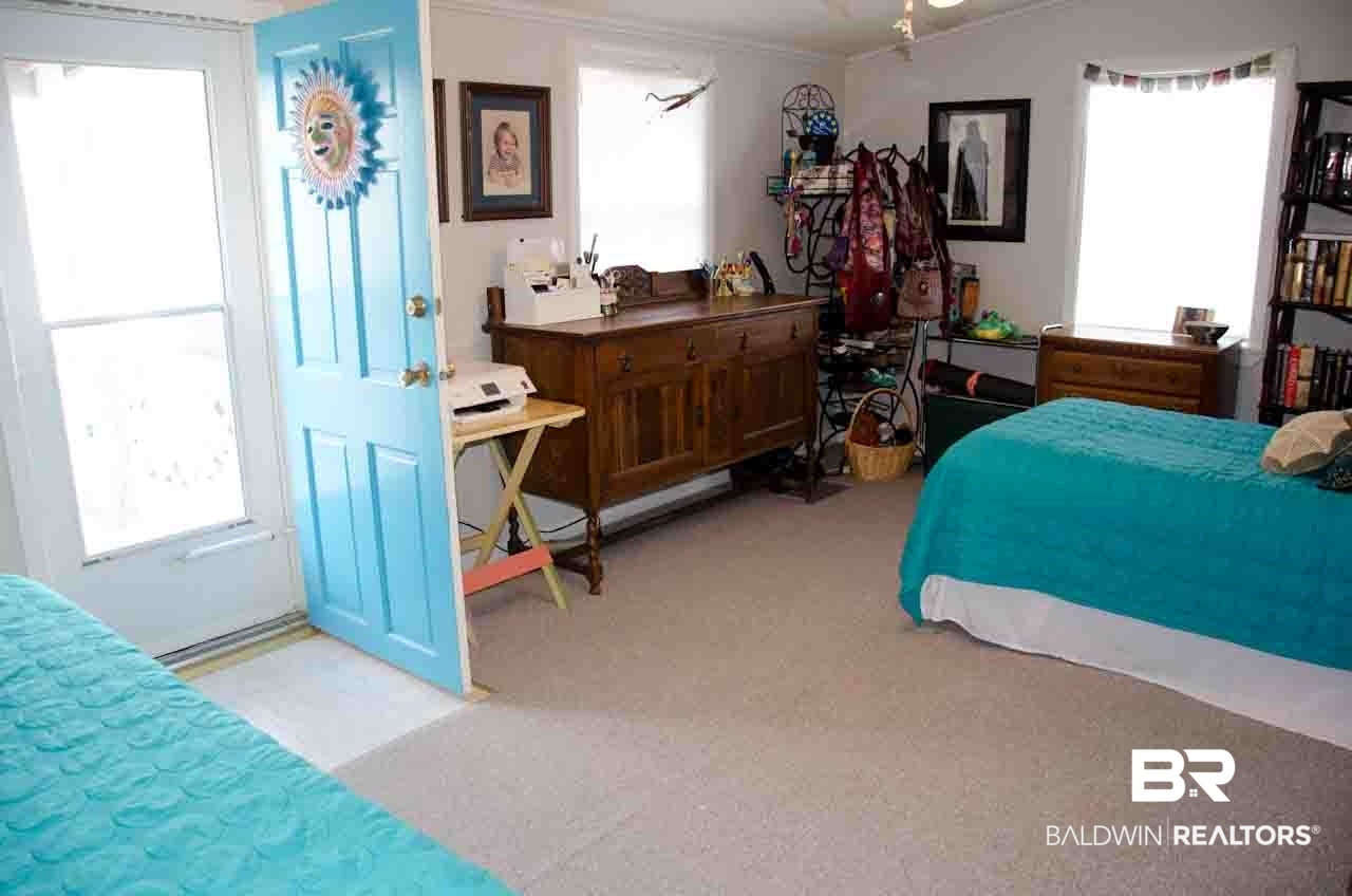 4236 Azalea Street Orange Beach, AL 36561 - Photo 26 of 45 Bedroom #2 with Door to Side Porch