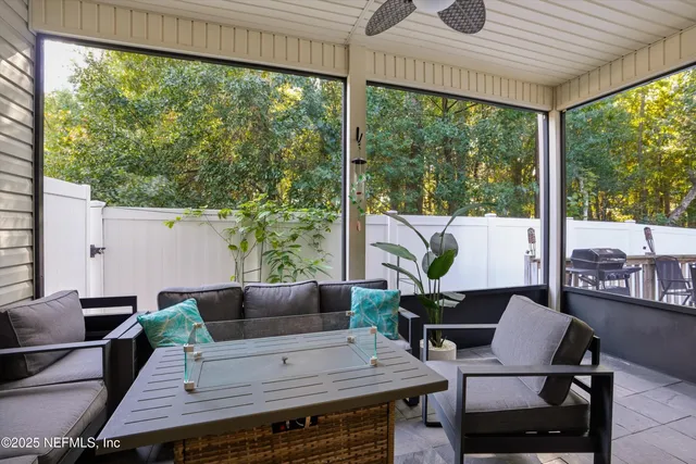 a outdoor living space with furniture and garden view