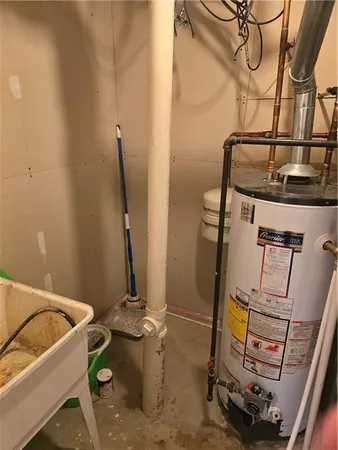 a bathroom with a sink and mirror