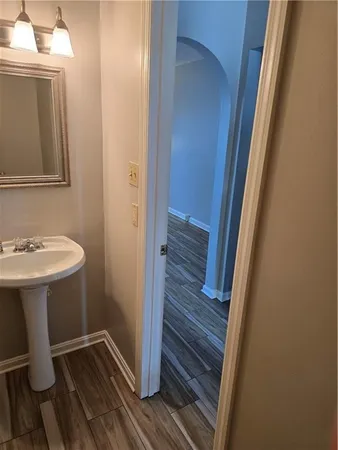 a bathroom with sink and mirror