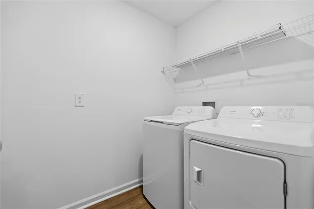 a utility room with dryer and washer