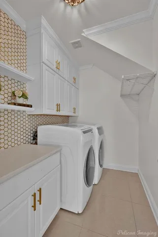 a kitchen with a stove and a large window