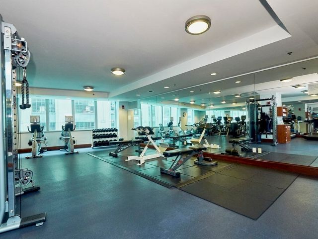 a room with lots of gym equipment