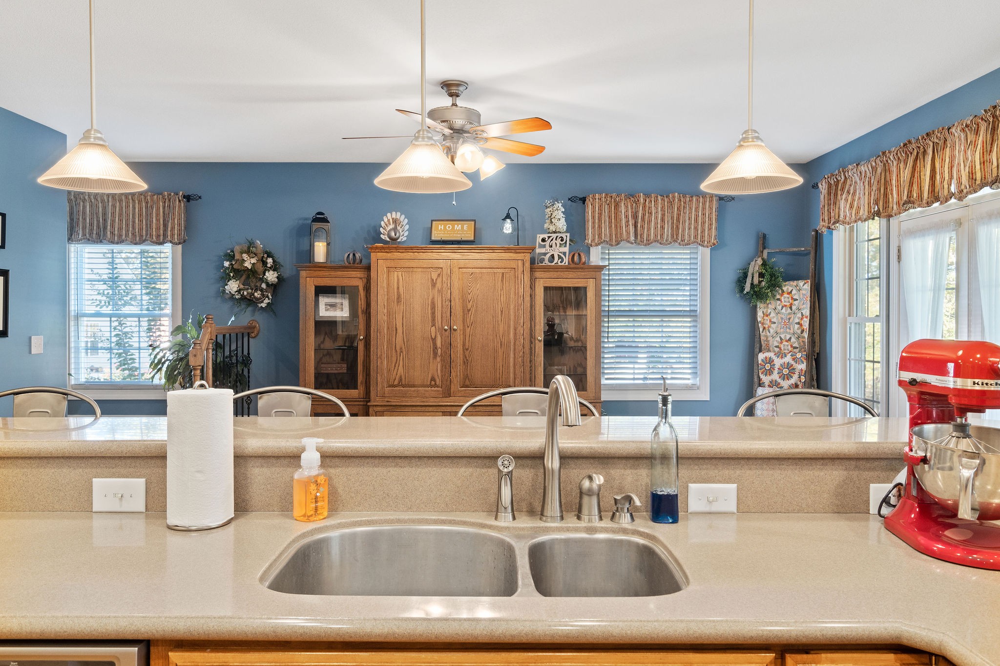 1488 Cooley Ford Road Tennessee Ridge, TN 37178 - Photo 14 of 46 a kitchen with a sink a chandelier and living room view