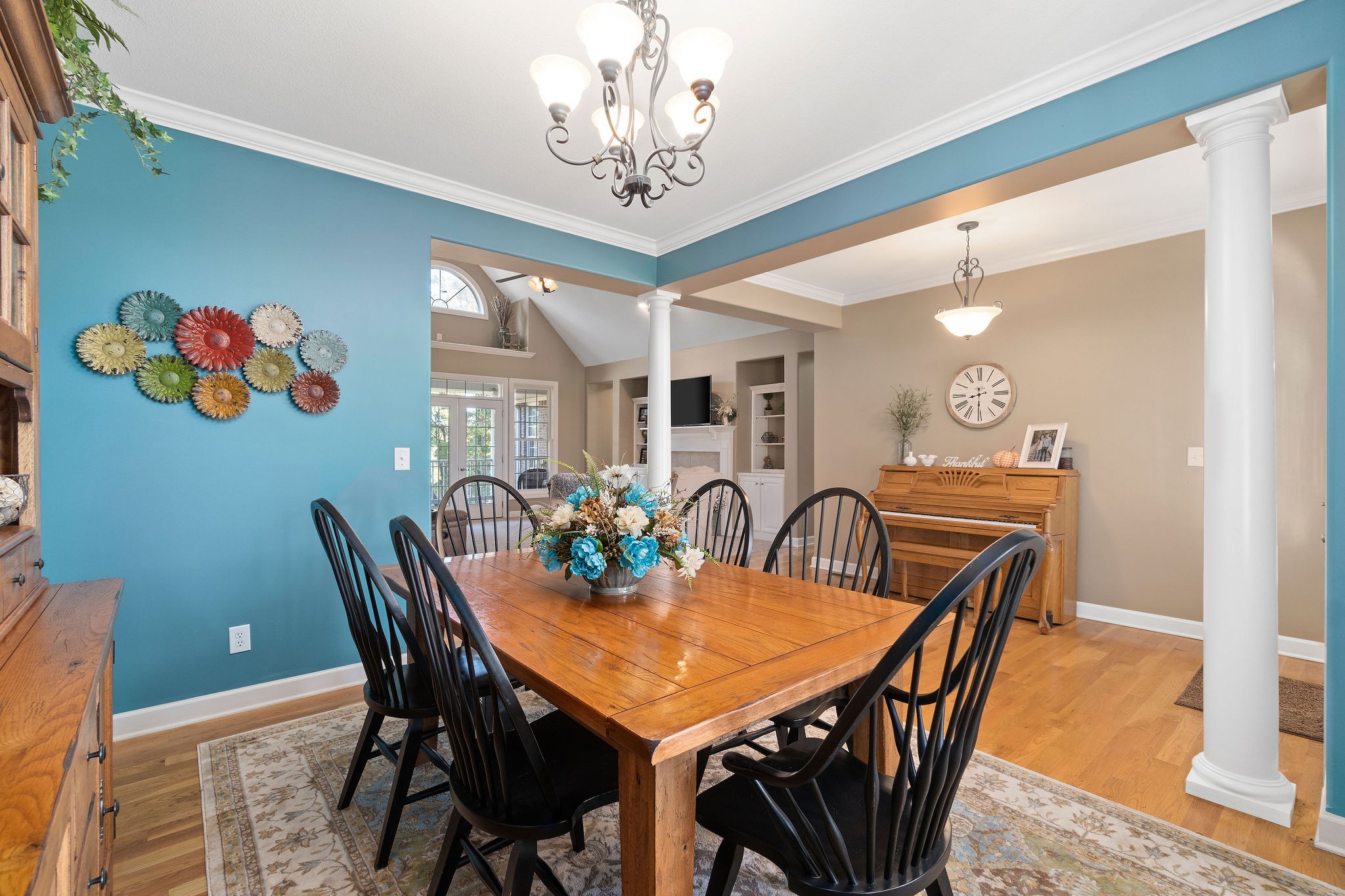 1488 Cooley Ford Road Tennessee Ridge, TN 37178 - Photo 18 of 46 a view of a dining room with furniture and chandelier