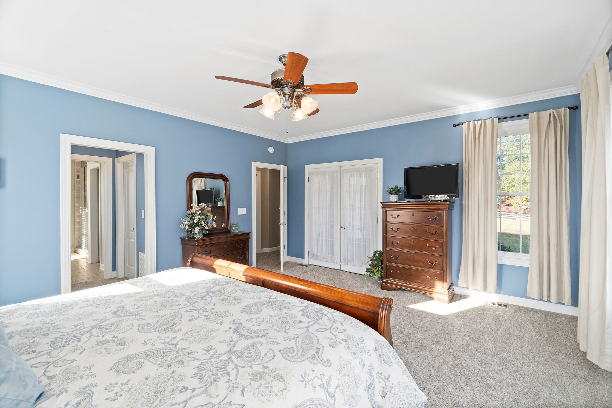 1488 Cooley Ford Road Tennessee Ridge, TN 37178 - Photo 23 of 46 a bedroom with a bed and a flat screen tv