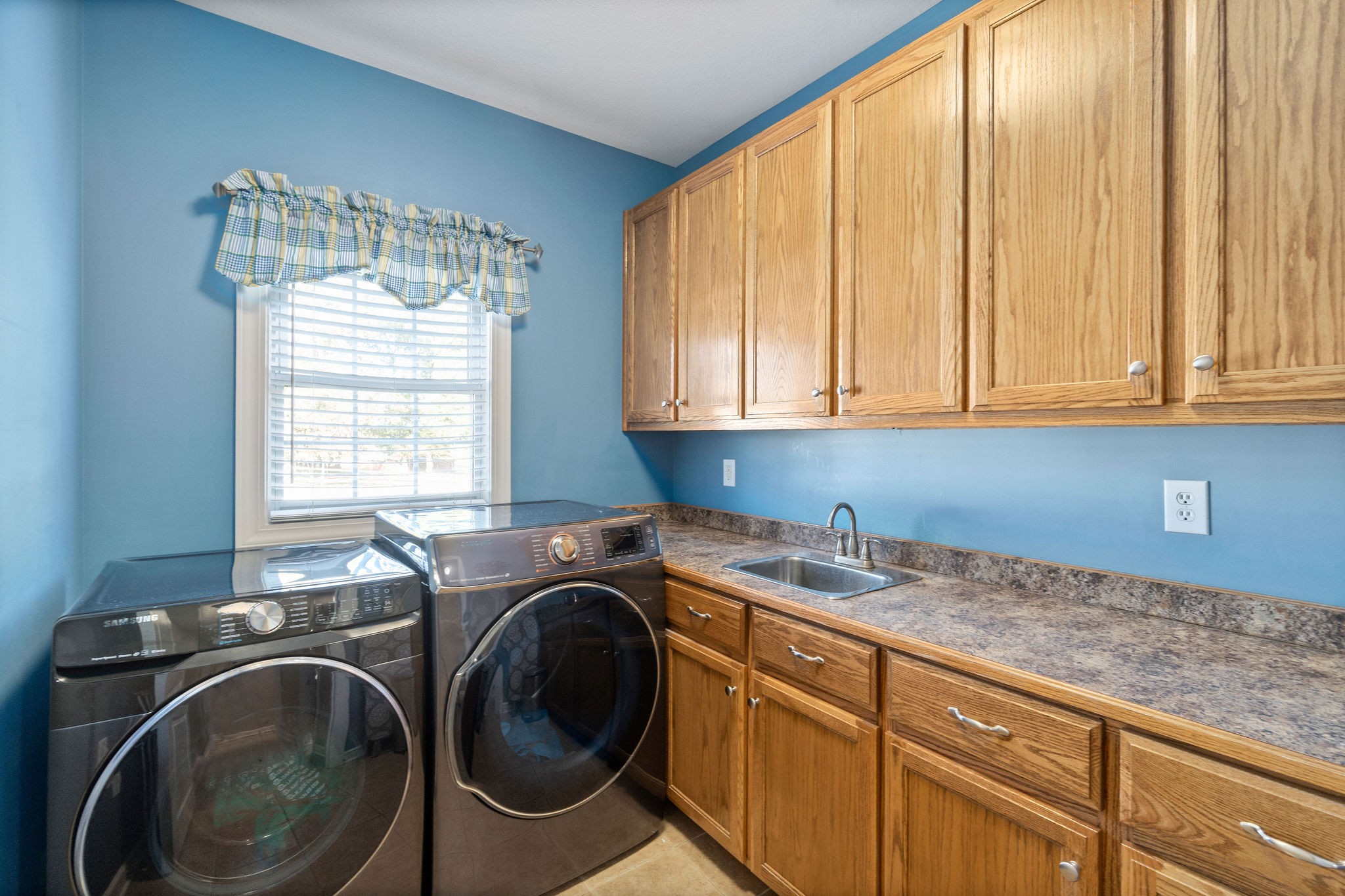 1488 Cooley Ford Road Tennessee Ridge, TN 37178 - Photo 26 of 46 a utility room with sink dryer and washer