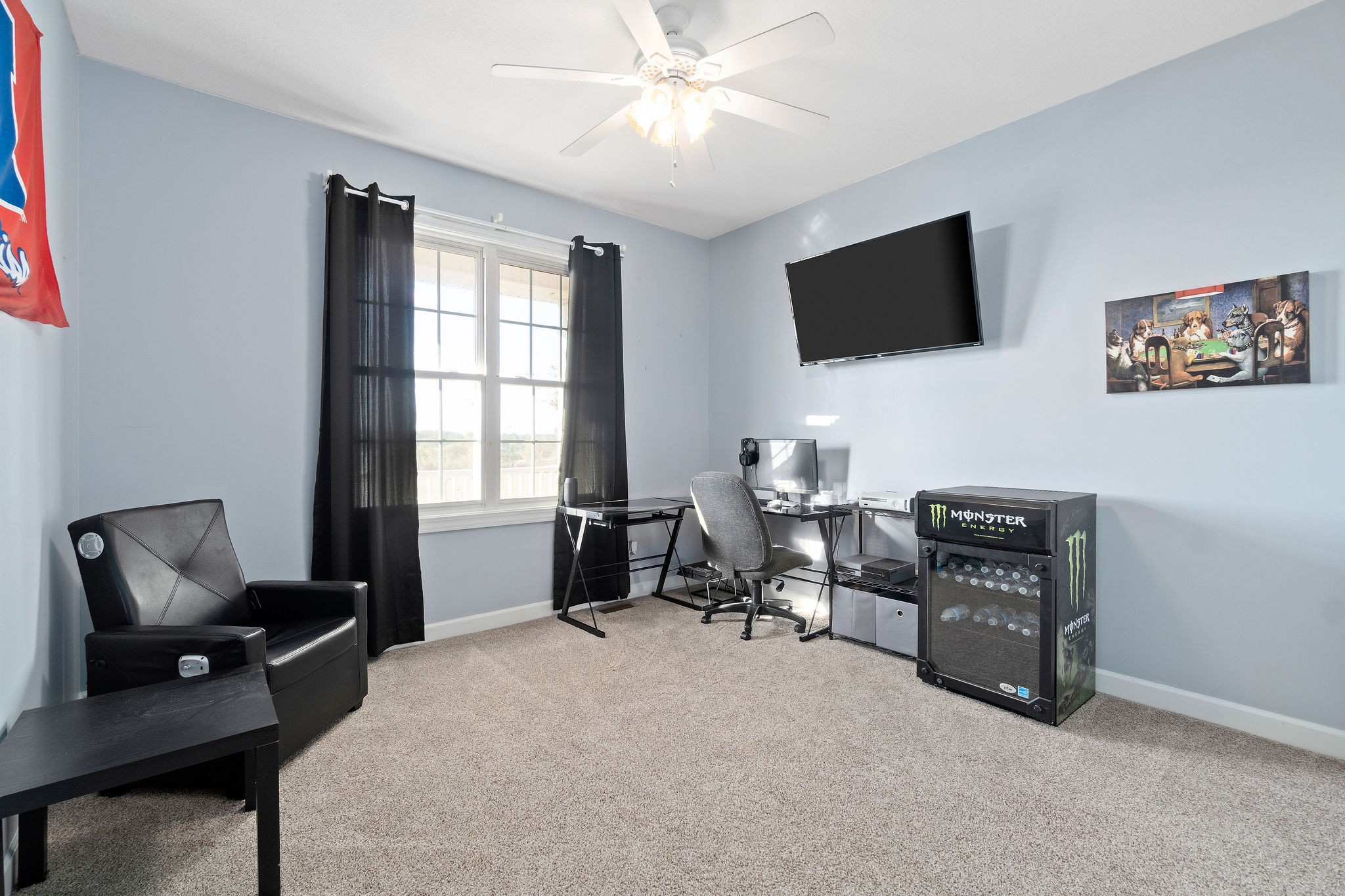 1488 Cooley Ford Road Tennessee Ridge, TN 37178 - Photo 27 of 46 a living room with furniture and a flat screen tv