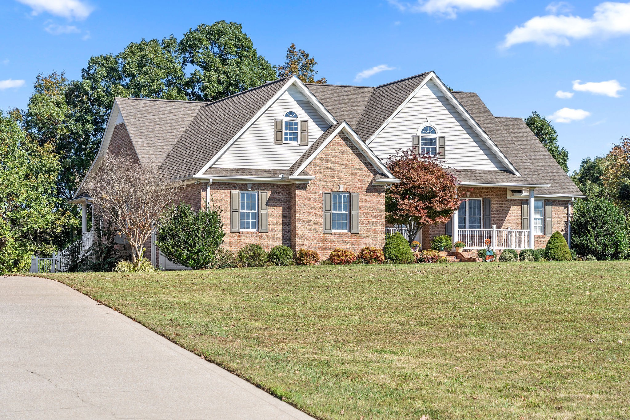 1488 Cooley Ford Road Tennessee Ridge, TN 37178 - Photo 4 of 46 a front view of a house with a yard