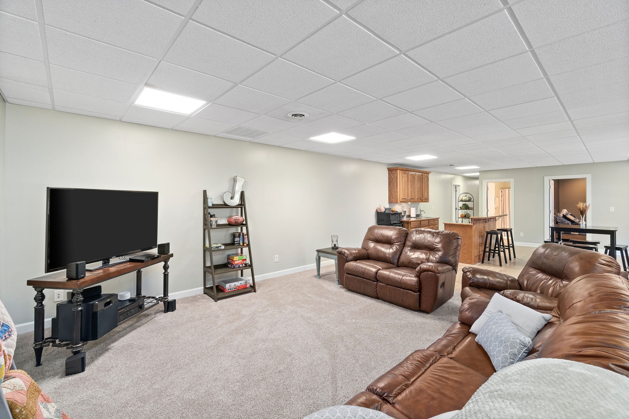 1488 Cooley Ford Road Tennessee Ridge, TN 37178 - Photo 35 of 46 a living room with furniture and a flat screen tv