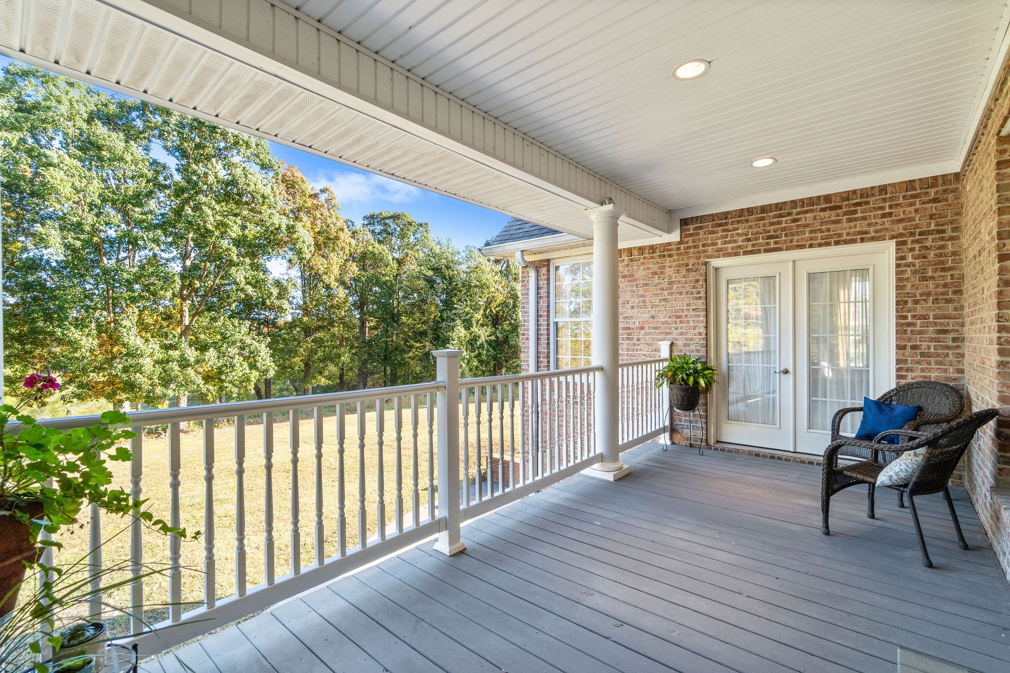 1488 Cooley Ford Road Tennessee Ridge, TN 37178 - Photo 40 of 46 a view of a porch with furniture and wooden floor