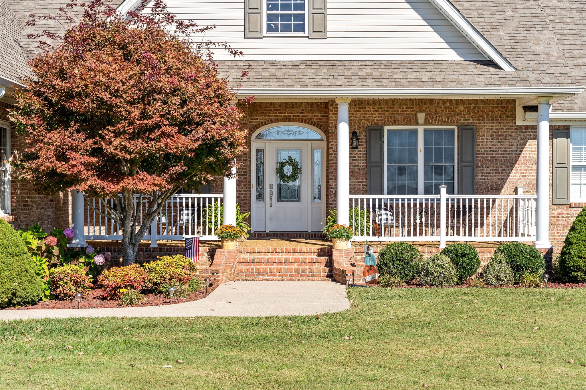 1488 Cooley Ford Road Tennessee Ridge, TN 37178 - Photo 5 of 46 front view of a house with a yard