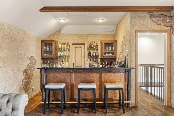 a view of a chair and table in a livingroom