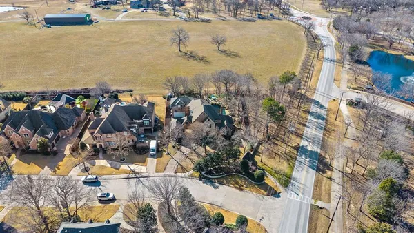 a aerial view of residential houses with outdoor space