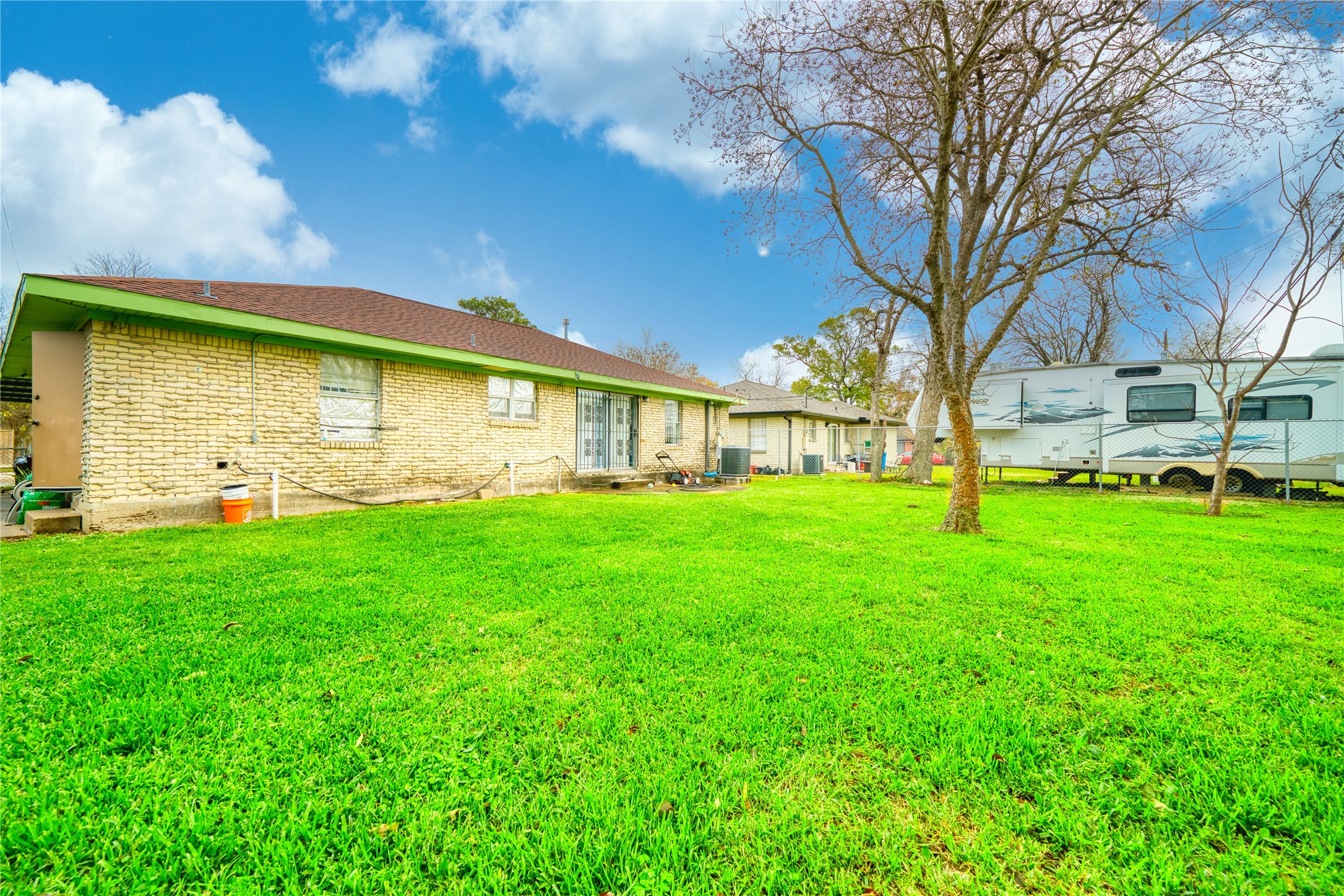 4931 Mercedes Lane Houston, TX 77022 - Photo 27 of 29 a view of a house with a backyard