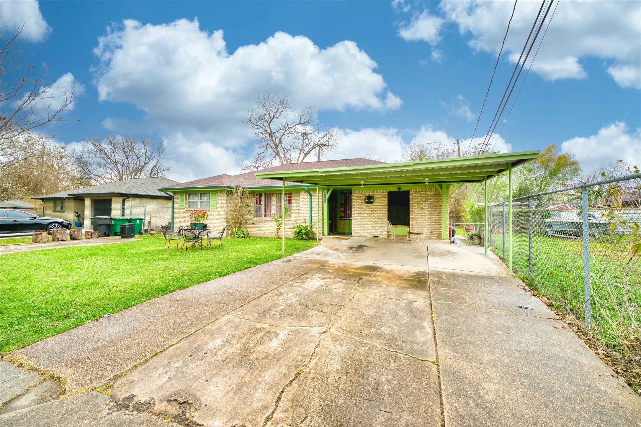 4931 Mercedes Lane Houston, TX 77022 - Photo 4 of 29 a view of a white house with a yard