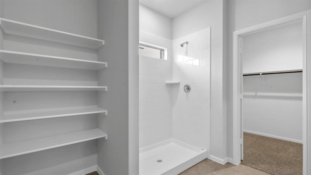 120 Mojave Road Boyd, TX 76023 - Photo 20 of 40 a bathroom with a glass shower door