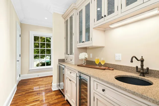 a kitchen with a sink and a window