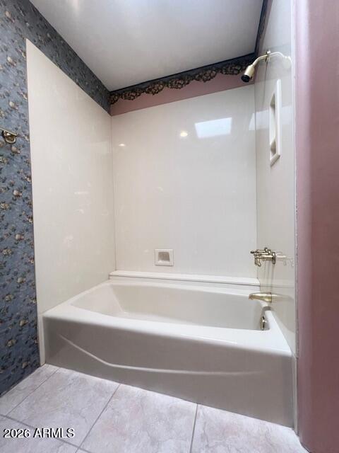 7707 East Primrose Path Carefree, AZ 85377 - Photo 11 of 42 a bathroom with a shower and a bath tub