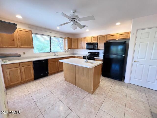 7707 East Primrose Path Carefree, AZ 85377 - Photo 22 of 42 a kitchen with a sink a counter top space cabinets and stainless steel appliances