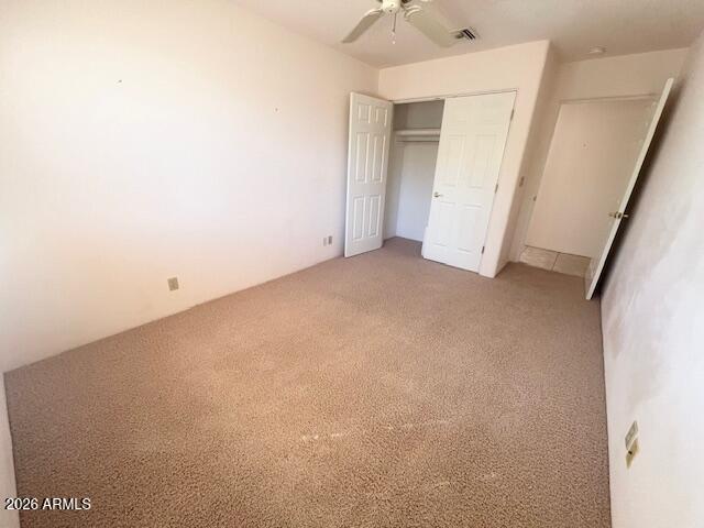 7707 East Primrose Path Carefree, AZ 85377 - Photo 8 of 42 an empty room with a window