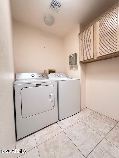 7707 East Primrose Path Carefree, AZ 85377 - Photo 9 of 42 a utility room with dryer and washer