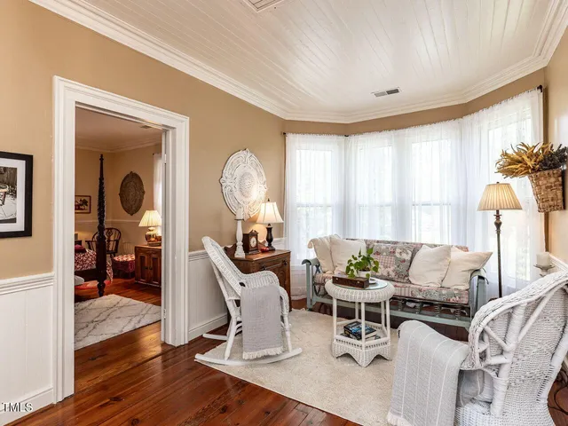 a outdoor space with lots of furniture and outdoor seating