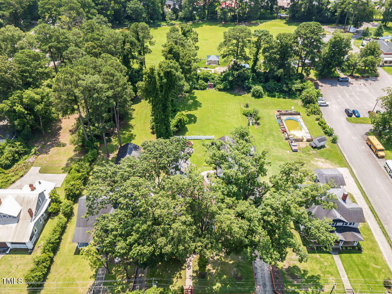 612 College Street Clinton, NC 28328 - Photo 56 of 70 an aerial view of ocean with residential house outdoor space and swimming pool