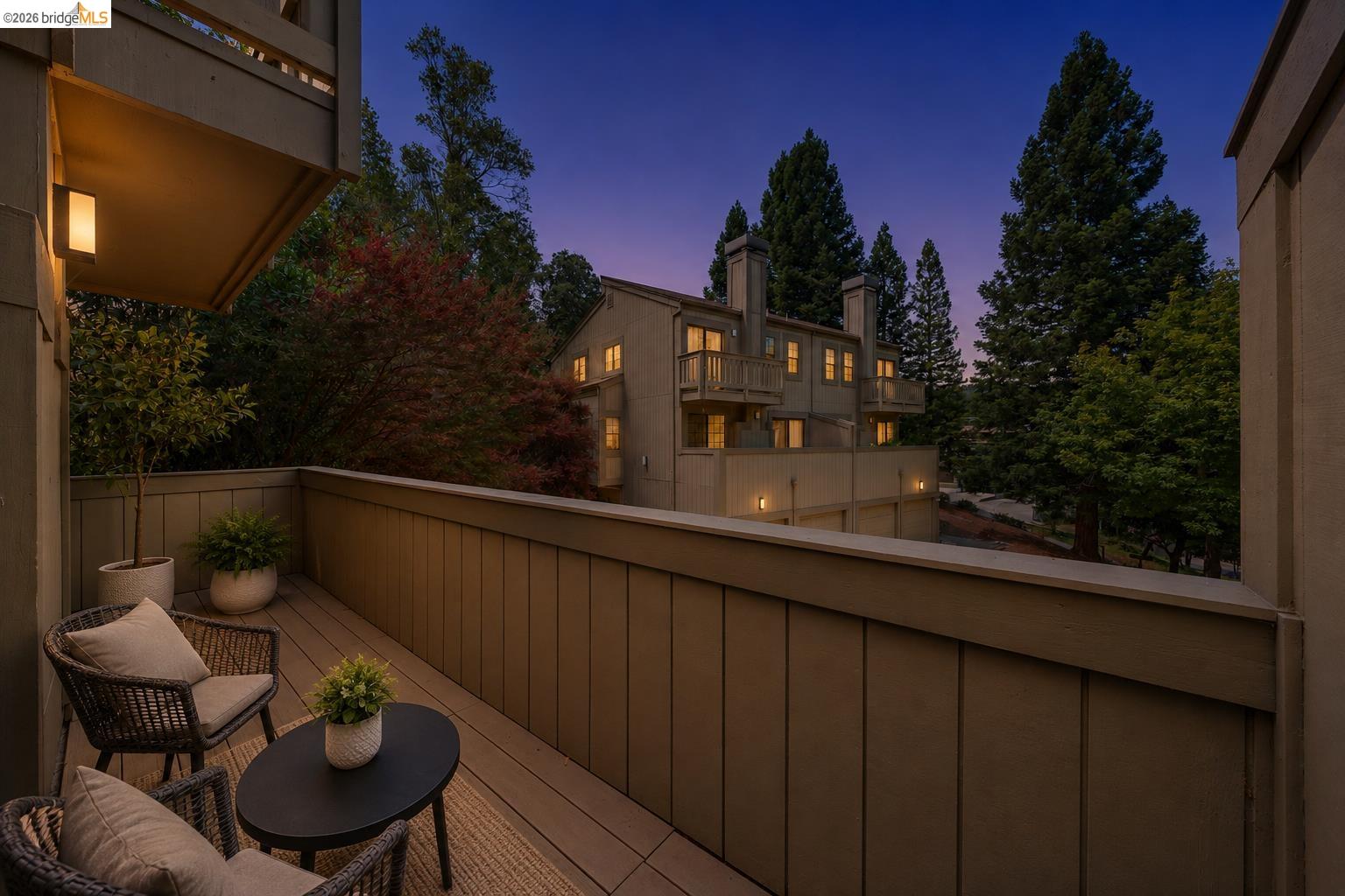 261 Redhawk Road Novato, CA 94949 - Photo 38 of 44 Private balcony featuring composite decking, a panelled railing, and an exterior wall light