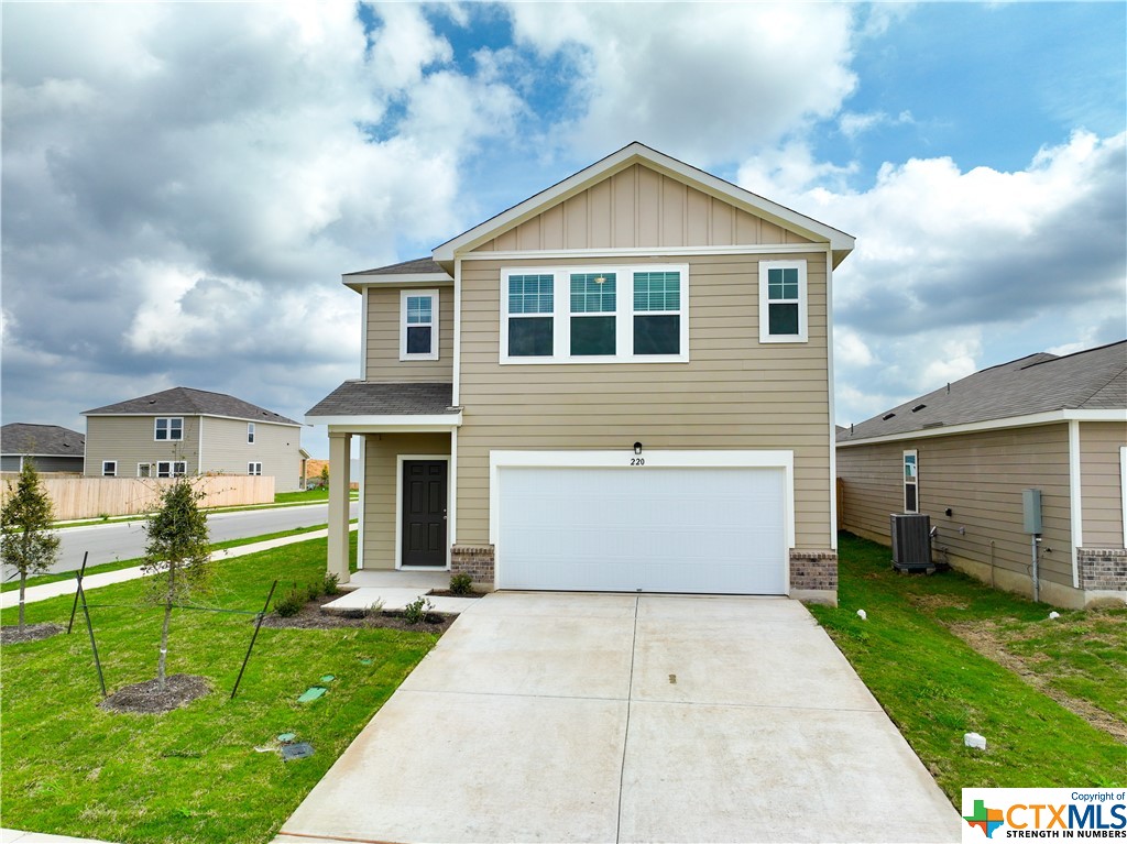 a front view of house with yard
