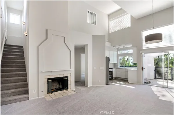 a view of a livingroom with a fireplace