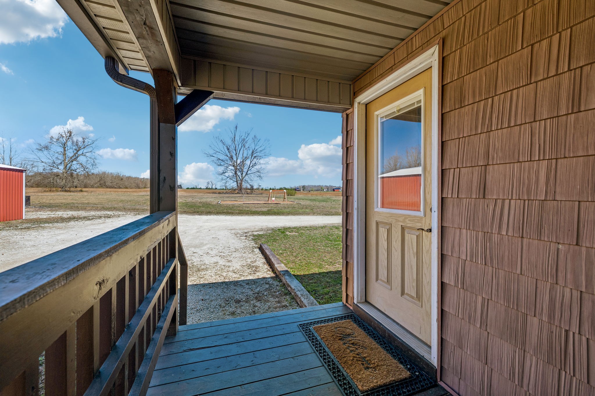 267 Switzerland Road Hohenwald, TN 38462 - Photo 9 of 98 a view of a balcony with wooden floor